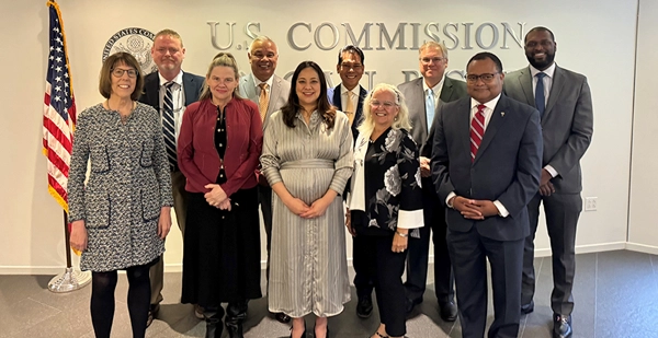 Photo of the Commissioners with the Chairs of the Puerto Rico and U.S. Virgin Island Advisory Committees after the April 2024 USCCR Business Meeting where each Chair presented their respective reports